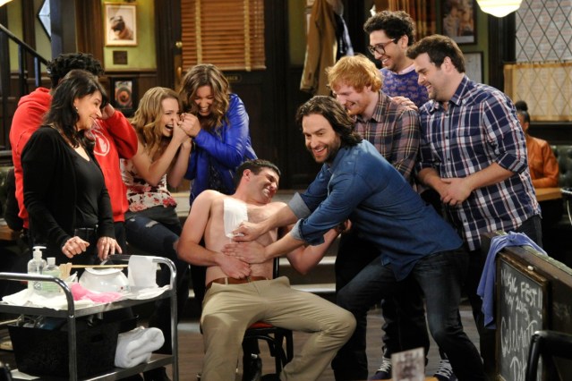 UNDATEABLE -- "A Live Show Walks Into A Bar" Episode 209 -- Pictured: (l-r) Ron Funches as Shelly, Bridgit Mendler as Candace, Bianca Kajlich as Leslie, Brent Morin as Justin, Chris D'Elia as Danny, Ed Sheeran as himself, Rick Glassman as Burski, David Fynn as Brett -- (Photo by: Darren Michaels/NBC/Warner Bros.)