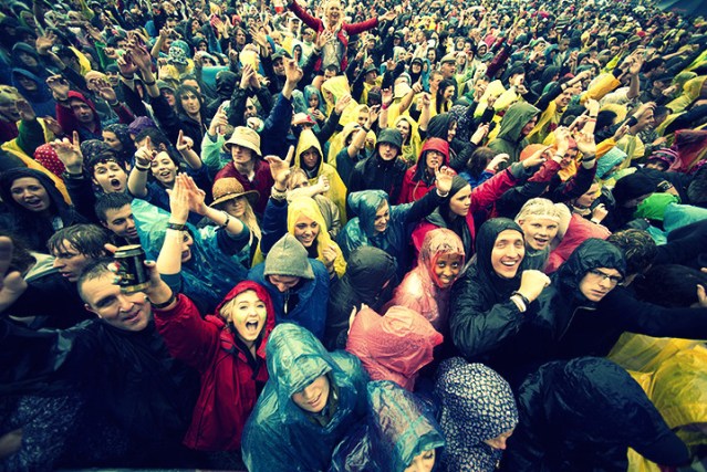 Festival Goers endure the rain at main stage during T In The Park Festival
